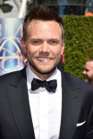 Joel McHale of The Soup arrives for the 2014 Primetime Creative Arts Emmys.