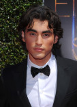 Blake Michael of Dog with a Blog arrives for the 2014 Primetime Creative Arts Emmys.