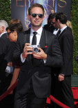 Patrick J. Adams of Suits arrives for the 2014 Primetime Creative Arts Emmys.