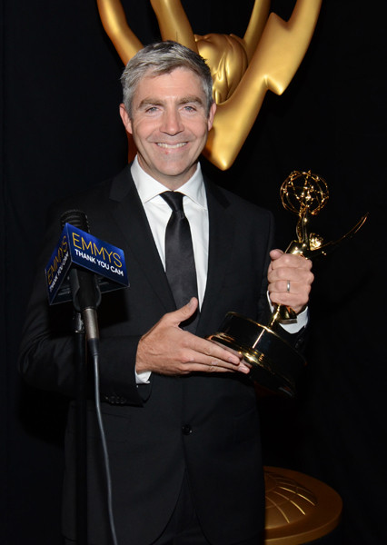 Adventure Time animator Nick Jennings celebrates his win at the 2014 Primetime Creative Arts Emmys.