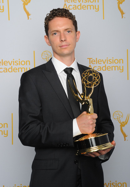 Ian Worrel celebrates at the 2014 Primetime Creative Arts Emmys.
