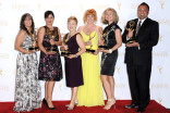 The Saturday Night Live hairstyling team celebrates their win at the 2014 Primetime Creative Arts Emmys.