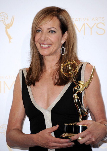 Masters of Sex guest actress Allison Janney celebrates her win at the 2014 Primetime Creative Arts Emmys.