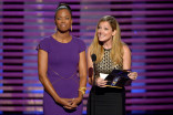 Presenters Aisha Tyler and Judy Greer at the 2014 Primetime Creative Arts Emmys.