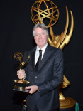 Cosmos: A SpaceTime Odyssey composer Alan Silvestri celebrates his win at the 2014 Primetime Creative Arts Emmys.