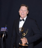 Brooklyn Nine-Nine stunt coordinator Norman Howell celebrates his win at the 2014 Primetime Creative Arts Emmys.