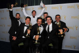 Deadliest Catch producers celebrate their win at the 2014 Primetime Creative Arts Emmys.