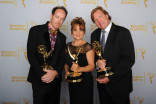 Dancing With the Stars camera operators Seth Saint Vincent (l), Bettina Levesque (c) and Mike Malone (r) celebrate their win at the 2014 Primetime Creative Arts Emmys.