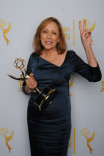 Cosmos: A SpaceTime Odyssey writer and producer Ann Druyan celebrates her win at the 2014 Primetime Creative Arts Emmys.