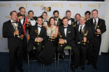 The Colbert Report cast and crew celebrate their win at the 2014 Primetime Creative Arts Emmys.