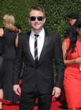 Chris Hardwick arrives for the 2014 Primetime Creative Arts Emmys.