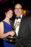 Susan Cahill (l) and Bill Cahill (r) celebrate at the 2014 Creative Arts Emmys ball.