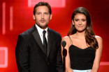 Peter Facinelli and Nina Dobrev presents an award at the Creative Arts Emmy Awards 