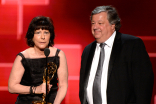 Karen Goodman and Kirk Simon accept their award at the 2015 Creative Arts Emmys.