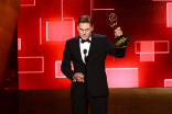 Norman Howell accepts his award at the 2015 Creative Arts Emmys.