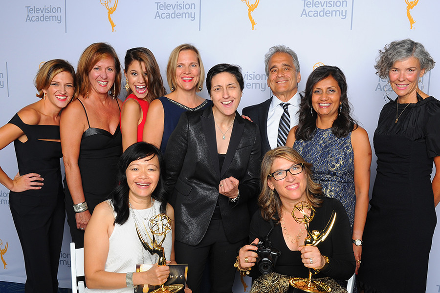 Rachel Darville, Becky Swanson, Shaina Holtz, kathryn Hempel, A. J. Hassan, Jonathan Gribetz, Karuna Rawal, Allison Amon, Judy John, and Lauren Greenfield backstage at the 2015 Creative Arts Emmy Awards.