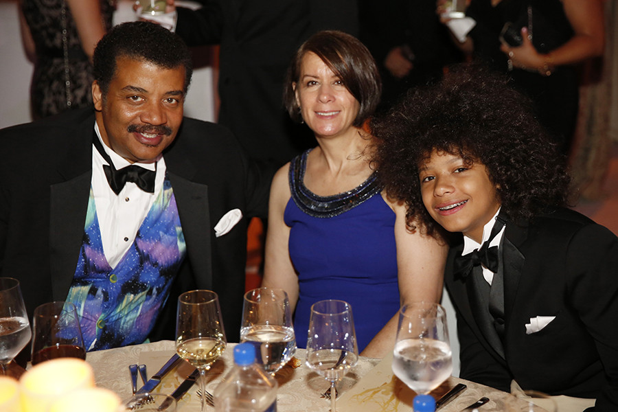 Neil deGrasse Tyson, wife, Alice Young, and son Travis Tyson attend the 2015 Creative Arts Ball.