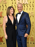 Mandy Fabian and Patrick Fabian on the red carpet at the 71st Emmy Awards. 