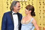 Vince Calandra and Emmanuelle Vaugier on the red carpet at the 71st Emmy Awards.