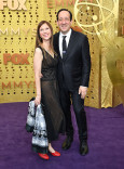 Jennifer Miner and David Miner on the red carpet at the 71st Emmy Awards.