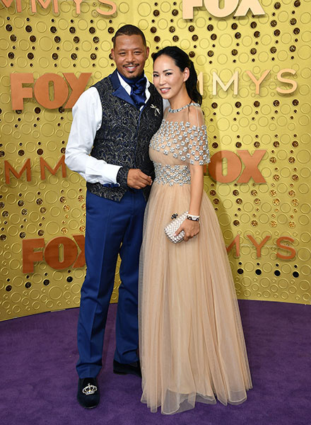 Terrence Howard and Mira Pak on the red carpet at the 71st Emmy Awards.