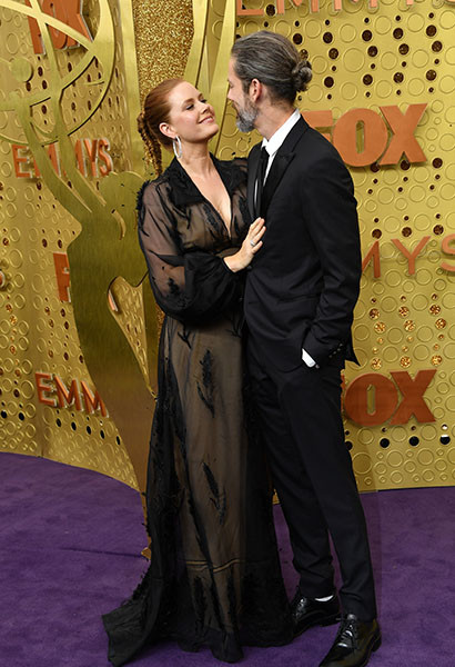 Amy Adams and Darren Le Gallo on the red carpet at the 71st Emmy Awards.