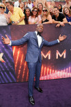 Akbar Gbaja-Biamila on the red carpet at the 71st Emmy Awards.