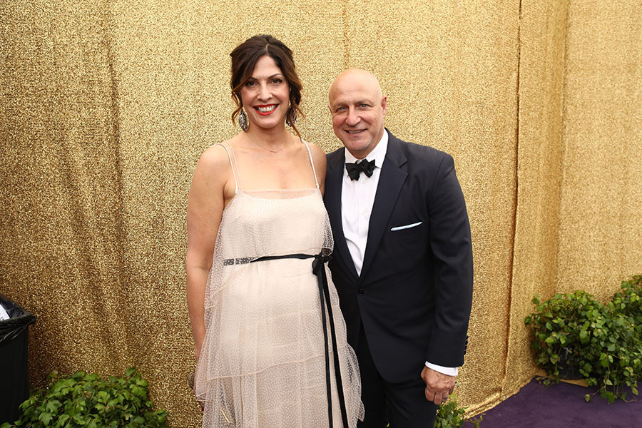 Lori Silverbush and Tom Colicchio on the red carpet at the 71st Emmy Awards.