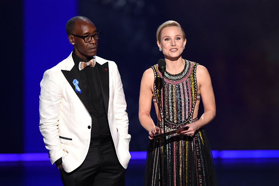 Don Cheadle and Kristen Bell present an award at the 71st Emmy Awards. 