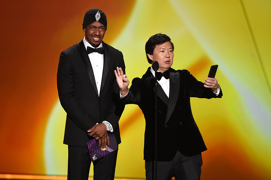 Nick Cannon and Ken Jeong present an award at the 71st Emmy Awards. 
