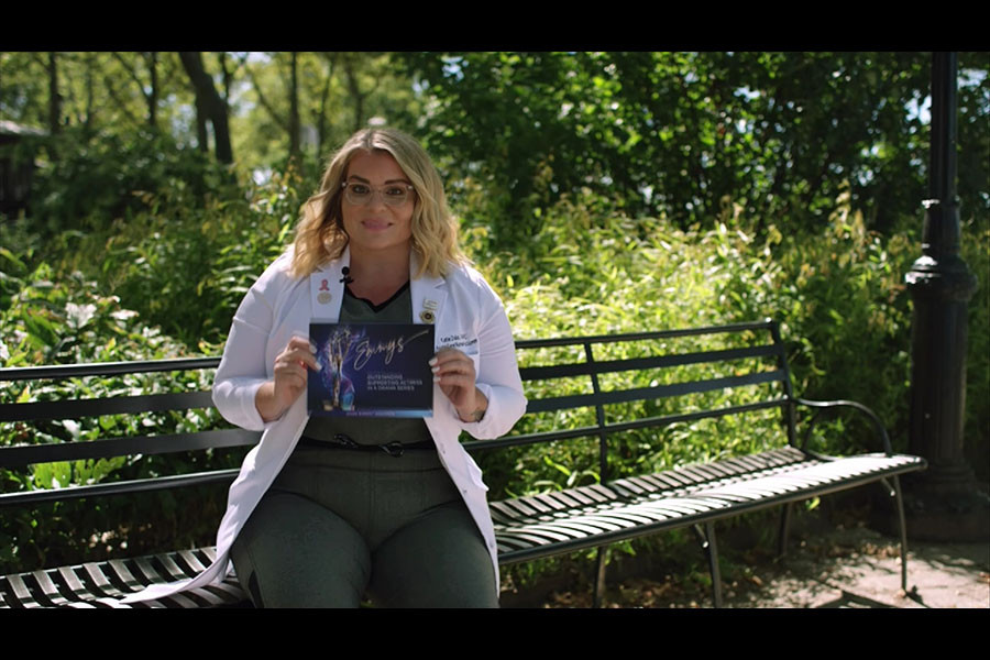 Katie Duke, essential worker and nurse practitioner, presents the award for Outstanding Supporting Actress in a Drama Series at the 72nd Emmy Awards.