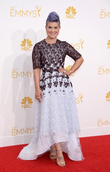 Kelly Osbourne of Fashion Police arrives at the 66th Emmy Awards.