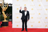 Eric Stonestreet of Modern Family arrives at the 66th Emmy Awards.