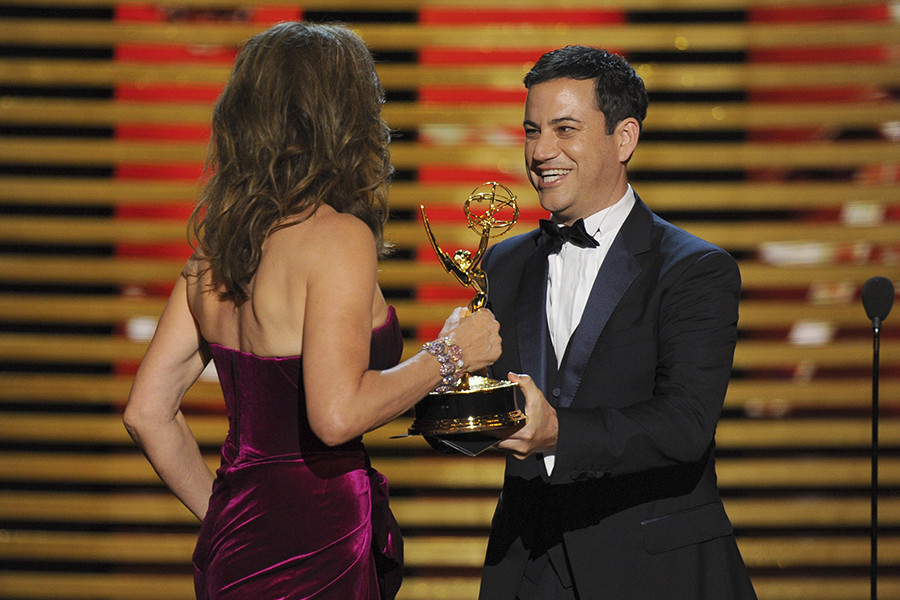 Jimmy Kimmel (r) presents an award to Allison Janney (l) of Mom.  