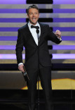 Chris Hardwick presents an award at the 66th Emmy Awards.
