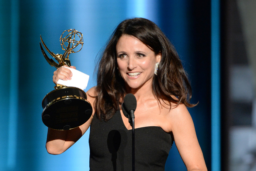 Julia Louis-Dreyfus accepts an award at the 67th Emmy Awards.