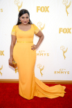 Mindy Kaling on the red carpet at the 67th Emmy Awards.