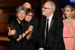Francis McDormand and the cast of &quot;Olive Kitteridge&quot; accept an award at the 67th Emmy Awards.