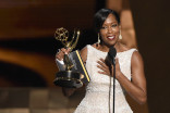 Regina King accepts an award at the 67th Emmy Awards.