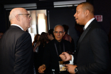 Jeffrey Tambour and Terrence Howard backstage at the 67th Emmy Awards. 