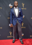 Akbar Gbaja-Biamila on the red carpet at the 2016 Primetime Emmys. 