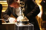 An Emmy statue being engraved at the 68th Emmys Governors Ball.
