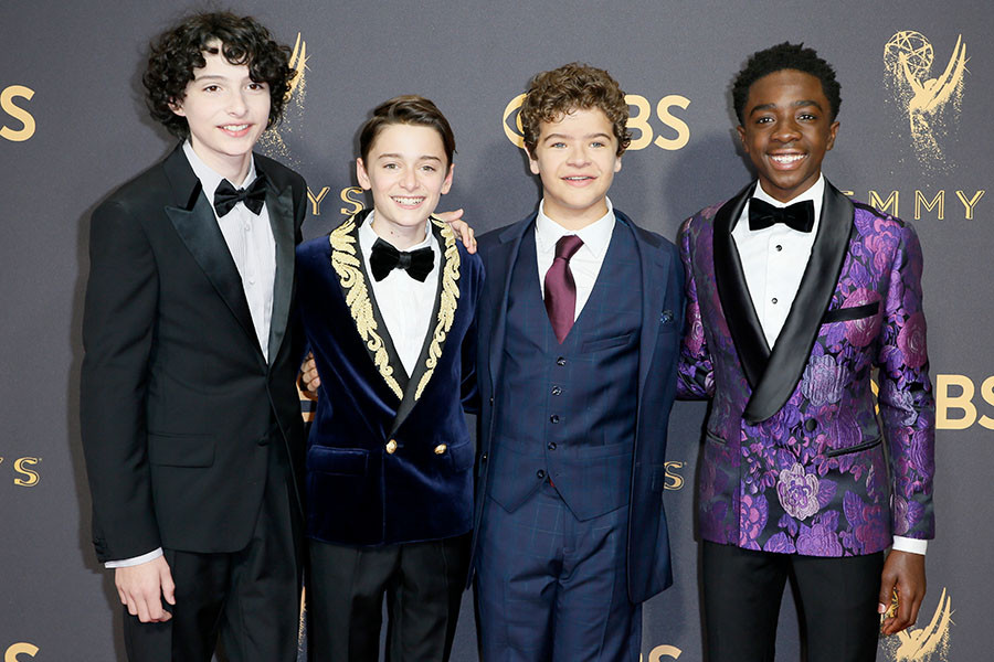 Finn Wolfhard, Noah Schnapp, Gaten Matarazzo, and Caleb McLaughlin on the red carpet at the 2017 Primetime Emmys.
