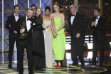 Charlie Brooker accepts her award at the 69th Primetime Emmy Awards