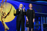 Norman Lear and Carol Burnett on stage at the 69th Emmy Awards.