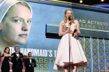 Elizabeth Moss accepts her award at the 69th Primetime Emmys