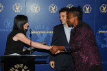 Television Academy governors Gail Mancuso and Fred Savage present a certificate to Dee Rees at the Directors nominee reception September 16, 2015, at the Directors Guild of America in Los Angeles, California.