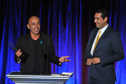 Editor Jaime Sanchez, right, and Cameraman Jorge Diaz of KVEA Telemundo 52 6pm Newscast accept the award for serious news story – single report for “Veteranos Desterrados” on stage at the Television Academy’s 66th Los Angeles Area Emmy Awards