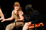 Jamie Brewer and Alexis Martin Woodall onstage at An Evening with the Women of American Horror Story in Hollywood, California.