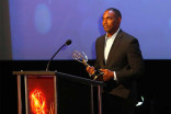 Jason George presents an award at the 68th Los Angeles Area Emmys, July 23, 2016, at the Saban Media Center, North Hollywood, California. 